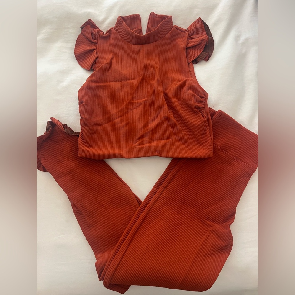 Devon Windsor Terracotta Ruffled Sleeveless Blouse and ruffle leggings